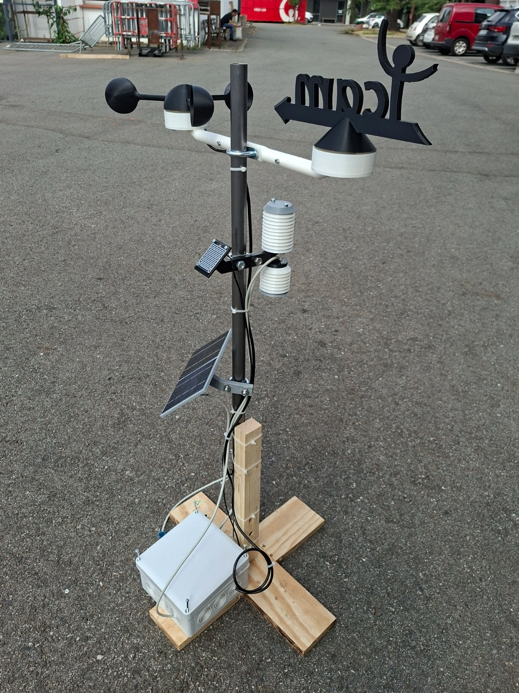 Weather station on a wooden cross